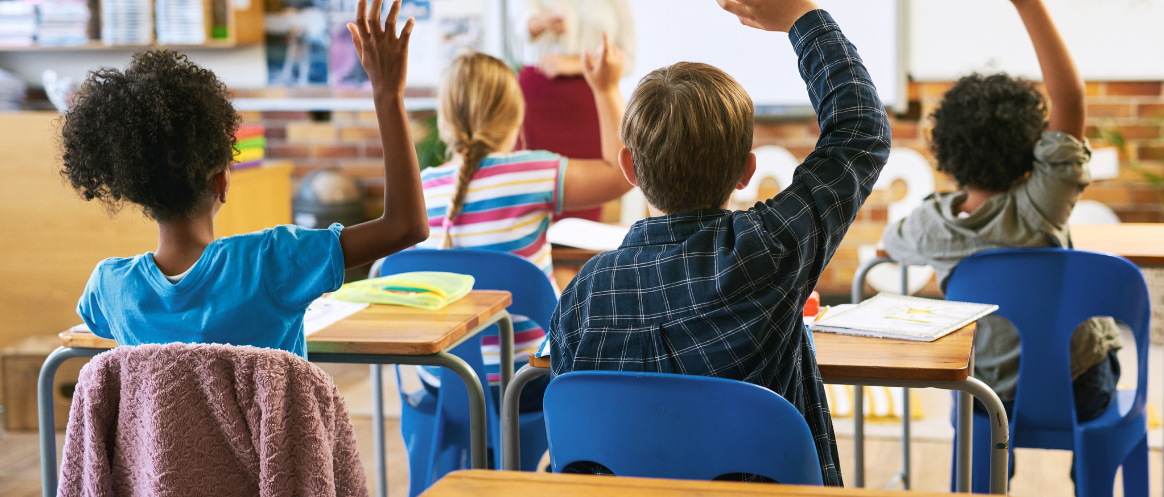 Students raising hands